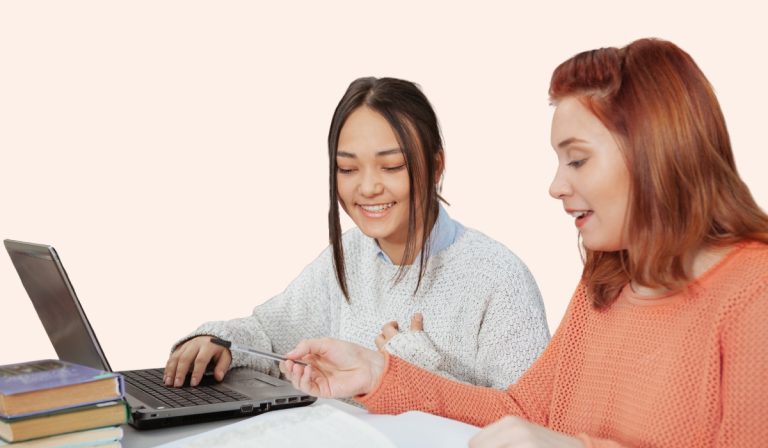 two students in library learinhg 10 Essential Things To Bring To Every Study Session