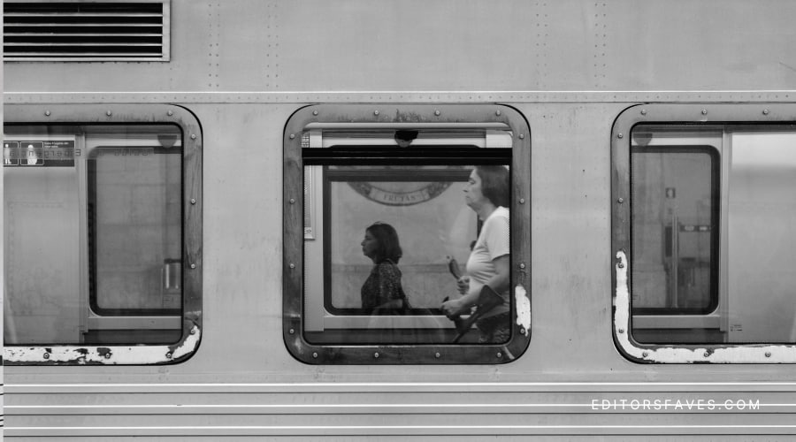 woman standing on train an example of How to Do the Train Method to shift realities