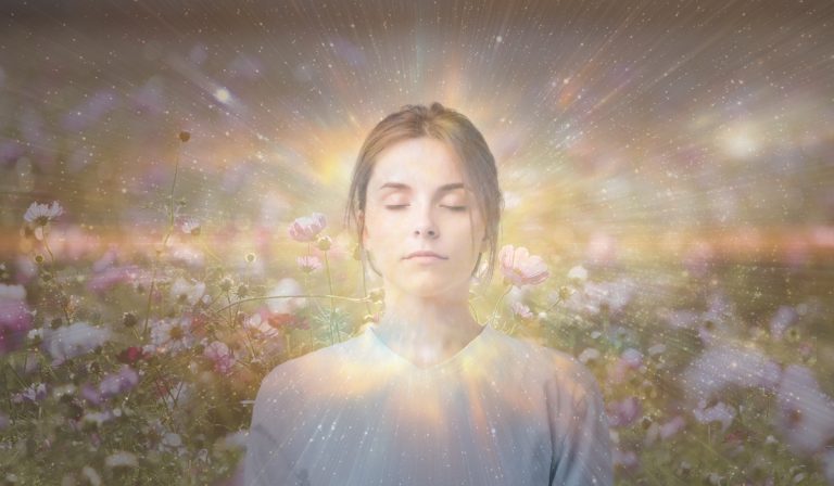 woman with closed eyes learning how How Past Life Regression Therapy Can Improve Your Current Life