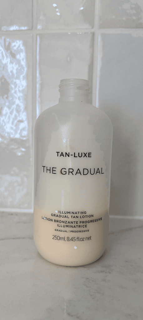 my half-empty bottle of Tan-Lux, which I found to be the Best Cruelty-Free Self-Tanners for face